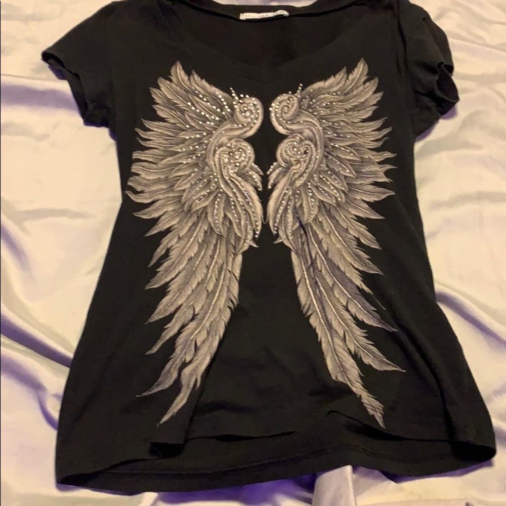 Black blinged angel wing shirt.